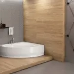 biała wanna narożna z obudową w aranżacji biała wanna narożna z obudową w aranżacji